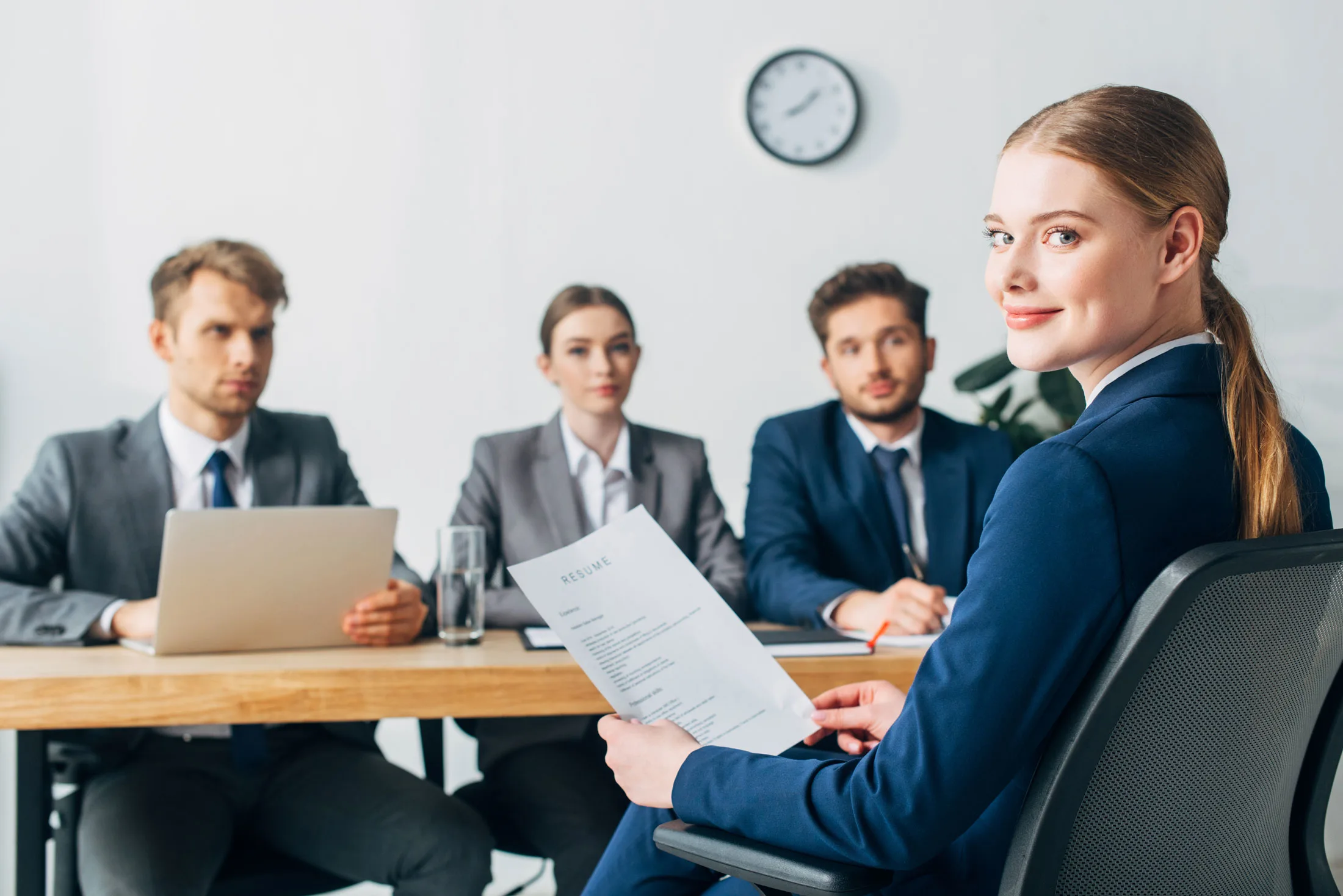 selective-focus-of-employee-looking-at-camera-whil-2024-11-17-14-34-39-utc2.webp